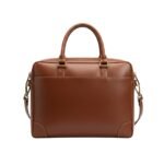 Rear view of a sleek brown leather briefcase with dual handles and gold-tone hardware, featuring an adjustable shoulder strap.