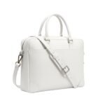 A sophisticated white leather laptop bag with dual handles, silver-tone accents, and an adjustable shoulder strap