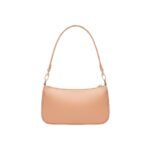 Minimalist leather shoulder bag in a soft peach tone with a sleek design and adjustable strap.