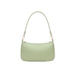 Light green leather shoulder bag, front view, showcasing a minimalist design with gold-tone hardware and an adjustable strap.