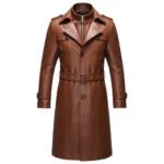 A sleek brown leather trench coat with a belted waist, double-breasted button detailing, notched lapels, and shoulder epaulets.