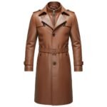 Front view of a brown leather trench coat with a belted waist, button closures, and sharp lapels.