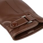 Close-up view of men’s dark brown leather gloves showing stitching detail and texture