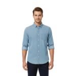 Men’s light blue button-down denim shirt, model front view on a white background.