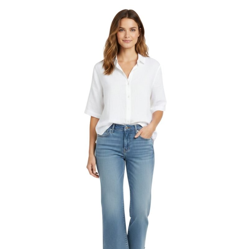 A woman in a white short-sleeve shirt and light-wash denim capri pants, standing and smiling against a white background.