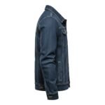 Men’s dark blue denim jacket side view showing buttoned sleeve cuffs and contrast stitching