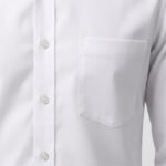 Close-up view of a white dress shirt showing the fabric texture, buttons, and placket on a neutral background.