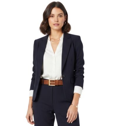 Women’s brown leather belt with a woven texture and a gold-tone rectangular buckle, shown on a model from the front.