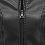 Close-up of a women’s black leather jacket zipper and stitching detail.
