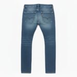 Back view of blue ripped jeans on white background, showing waistband, back pockets, and red brand tag.