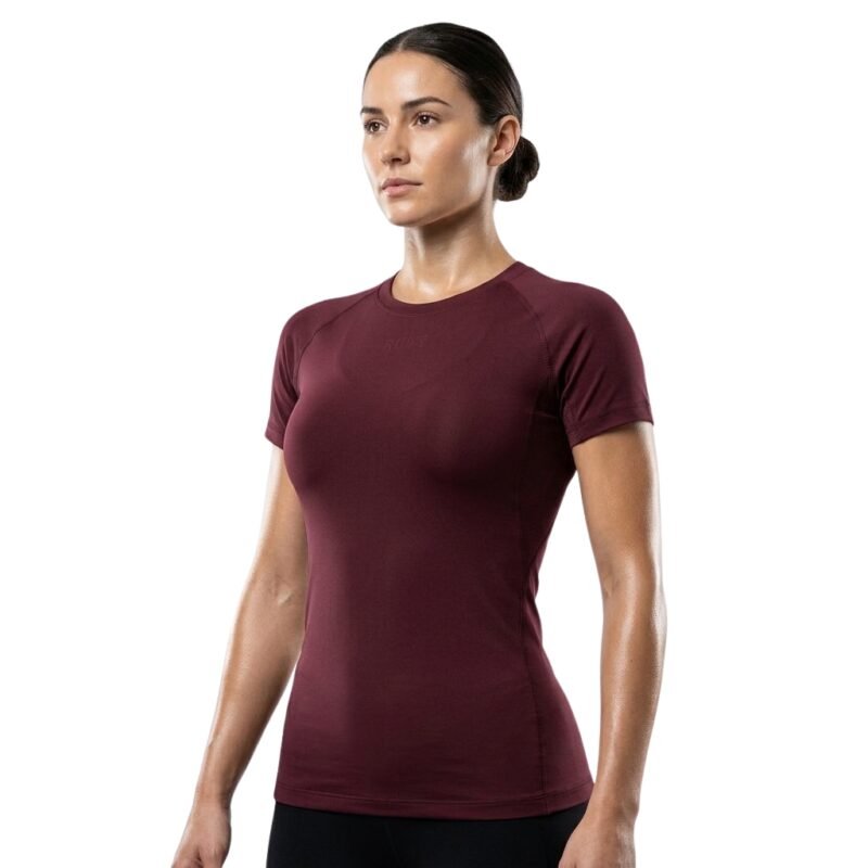 Women’s black compression shirt, full model view.