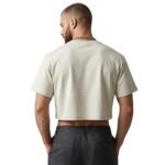 Man wearing athletic crop top, back model view.