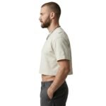 Man wearing athletic crop top, side model view.