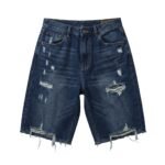 Dark blue baggy denim short with washed finish and ripped knees