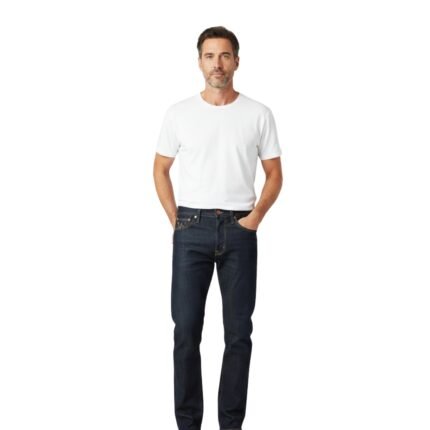 Man in white T-shirt and dark raw denim jeans, standing with hands in pockets, full-body front view on white background.