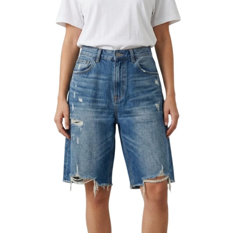 Denim baggy short in blue wash with ripped details and frayed hem