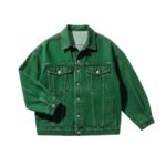 Green denim jacket with button-front placket, pointed collar, flap chest pockets with button closures, and long sleeves with button cuffs.