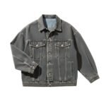 Gray denim jacket featuring a button-front placket, flap chest pockets with button closures, and long sleeves with button cuffs.