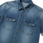 Light blue wash denim short-sleeve button-up shirt with pointed collar and two flap chest pockets