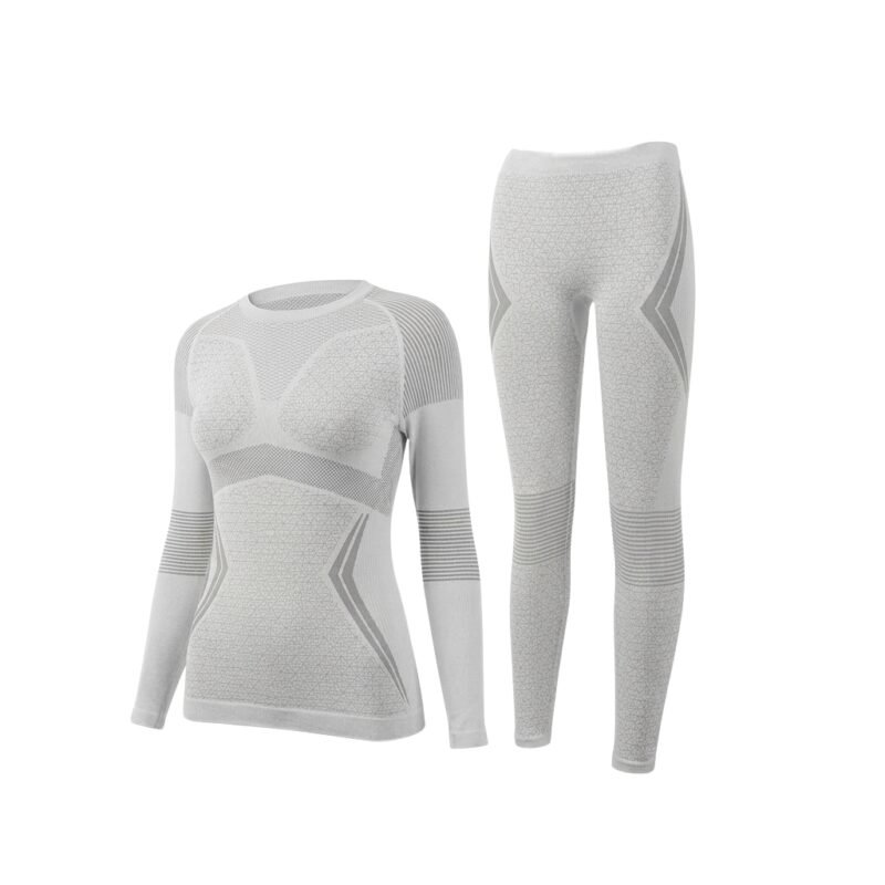 Long-sleeve seamless grey women’s ski base layer top and matching leggings, front view on a white background.