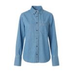 Sky blue oversized denim shirt with button-down collar and chest pocket, on white background.