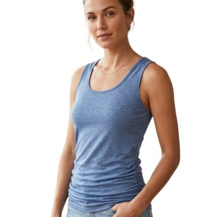 Front view of a woman wearing a fitted athletic tank top and leggings, standing in a relaxed pose