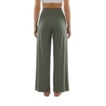 Back view of a woman wearing wide-leg yoga pants and a fitted top, showing waistband and relaxed drape