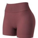Women’s high-waisted yoga shorts in Deep Tuscan Red color, laid flat to show style and length
