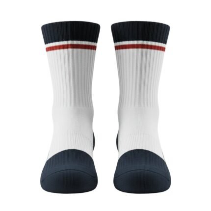 Full front view of yellow-green basketball soft socks laid flat, showing the calf-length design, ribbed cuffs, cushioned footbed, and small logo icon near the top.