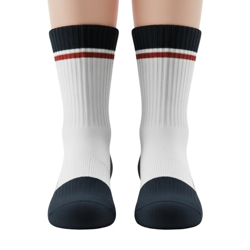 Model wearing yellow-green basketball soft socks, standing to show the calf-length fit, ribbed cuffs, and small logo icon near the top.