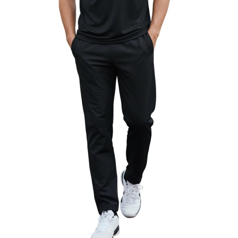 Male model wearing basketball sweatpants, showing a relaxed straight-leg fit, elastic waistband, and small logo icon near the upper leg.