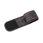Basketball wrist strap open view laid flat, showing the full length of the adjustable wrap, hook-and-loop closure area, and small logo icon on the end tab.