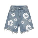 Assorted distressed denim shorts in multiple washes arranged side by side.