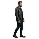 Male model wearing a black leather biker jacket side view.