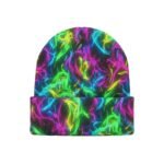 A beanie hat with a black base and swirling multicolor pattern in green, yellow, pink, and blue, photographed against a white background.