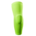 A close-up studio shot of a bright green compression knee sleeve on a white background. The sleeve has vertical ribbing and a rounded, slightly raised padded section at the knee.