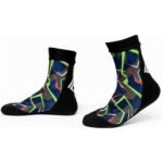 Pair of MMA training socks laid flat, showing mid-length cuffs, reinforced heel and toe areas, and a textured non-slip grip sole pattern.