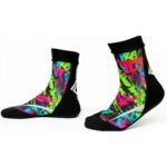 Pair of MMA training socks laid flat, featuring mid-length cuffs, reinforced heel and toe areas, and a patterned non-slip grip sole.