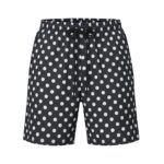 Front view of men’s badminton shorts made from lightweight performance fabric, laid flat on a plain background with a small logo icon near the hem.