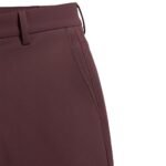 Close‑up view of men’s classic‑fit golf pants fabric and waistband, showing the smooth quick‑dry, water‑resistant material and clean stitching detail.