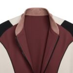 Close-up view of men's tennis jacket showing fabric detail and performance construction