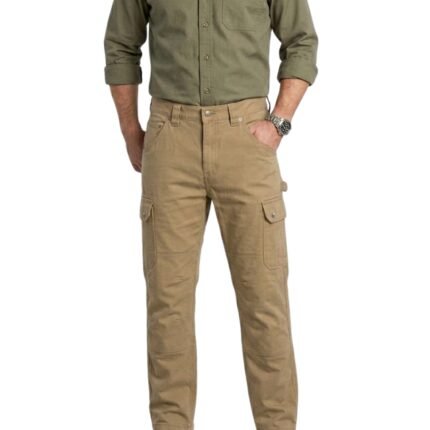 Male model wearing navy industrial workwear pants and safety shoes, standing in a relaxed pose.