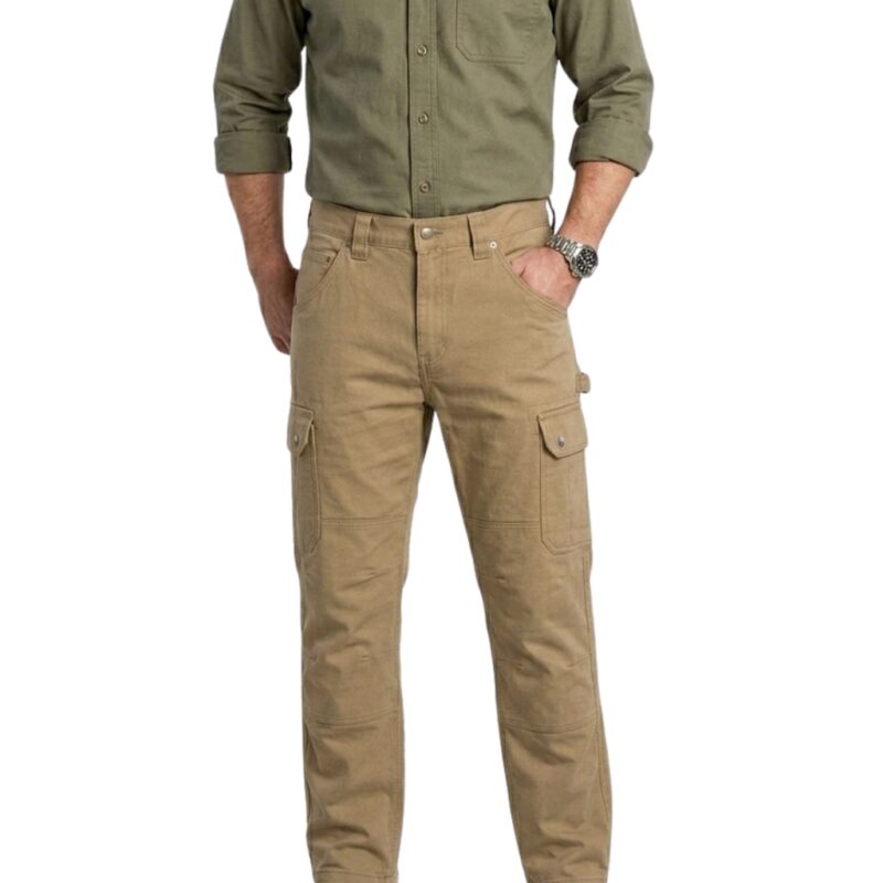 Male model wearing navy industrial workwear pants and safety shoes, standing in a relaxed pose.