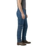 Male model wearing men’s motorbike jeans shown from the side view.