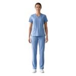 Nurse wearing a light blue nurse dress, front view on plain background.