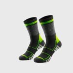 Pair of performance court socks laid flat, featuring a crew length design with contrasting toe, heel, and cuff details
