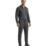 Full-body view of a model wearing a men’s polo tracksuit