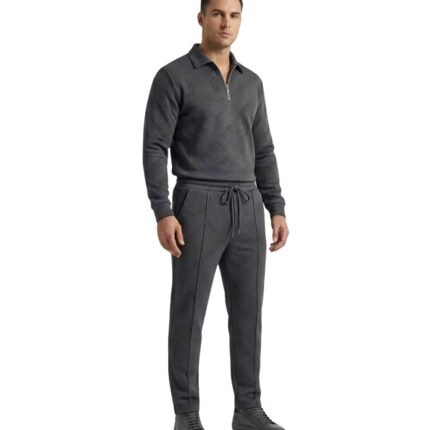 Full-body view of a model wearing a men’s polo tracksuit