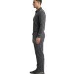 Side view of a model wearing a men’s polo tracksuit.