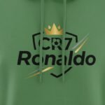 Close-up view of a Ronaldo fan pullover hoodie, focusing on the front graphic logo, fabric texture, and hood detail.